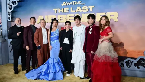 Getty Images (L-R) Actors Paul Sun-Hyung Lee, Daniel Dae Kim, Ken Leung, Kiawentiio, Gordon Cormier, Ian Ousley, Dallas Liu and Elizabeth Yu.