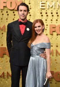 Sacha Baron Cohen and Isla Fisher (Photo by WWD/Penske Media via Getty Images)