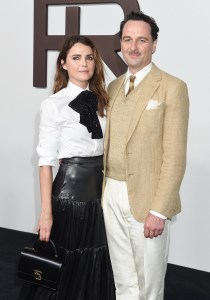 Keri Russell and Matthew Rhys at the Ralph Lauren Spring 2024 Ready To Wear Fashion Show at the Brooklyn Navy Yard on September 8, 2023 in Brooklyn, New York. (Photo by Gilbert Flores/WWD via Getty Images)